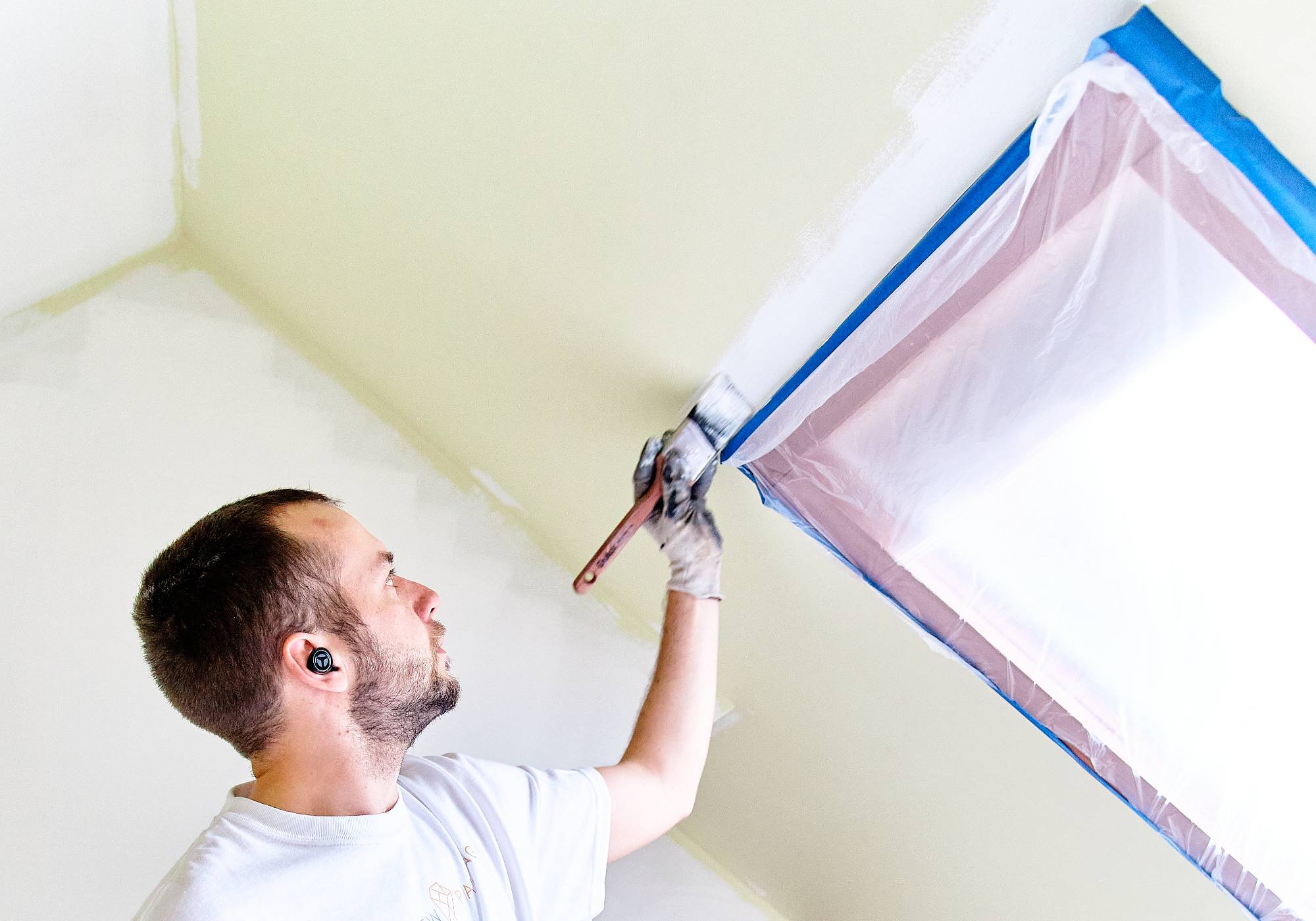 interior painter painting the inside of a home