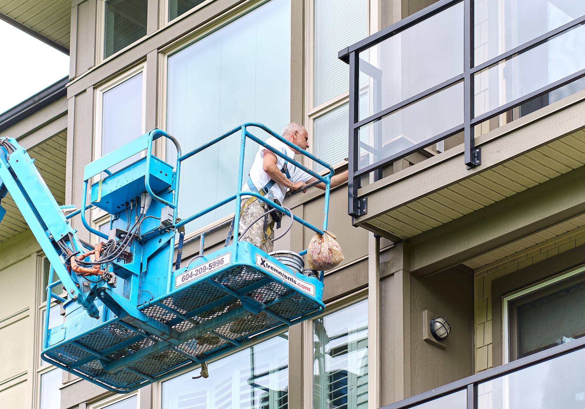 painting-with-crane-exterior-condo